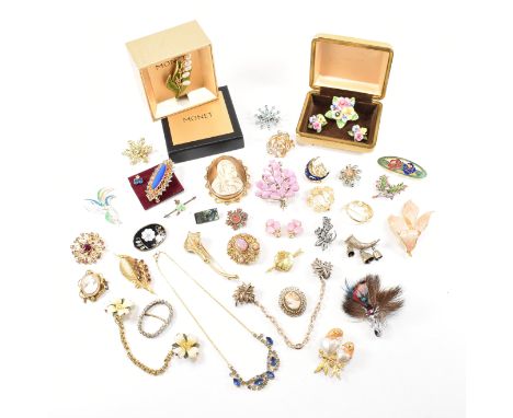 A collection of vintage and modern costume jewellery brooches. The brooches to include Monet, gold tone silver tone, paste, t