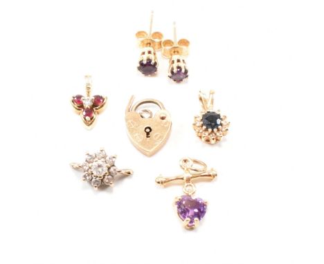 An assorted collection of hallmarked 9ct gold and yellow metal jewellery. The lot to include a rose gold heart padlock clasp 