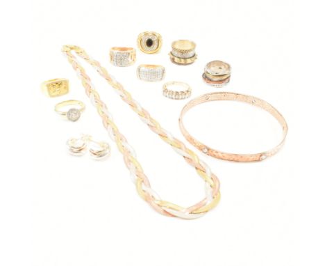 An assorted collection of 925 silver gold tone jewellery. The lot to include sapphire, yellow, rose and white gold toned meta