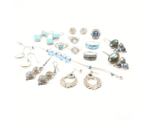 An assorted collection of silver and white metal jewellery. The lot to include sapphire, topaz, labradorite, turquoise, moons