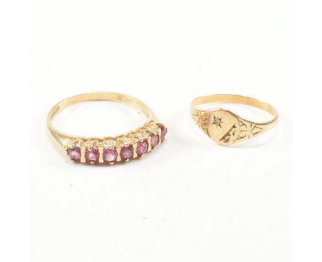 Two 9ct yellow gold stone set rings. The first ring having seven claw and bar set round cut rubies to knife edge shoulders an