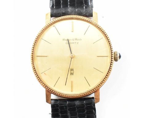 A vintage 18ct gold cased Mappin &amp; Webb wristwatch. The watch having a circular old k tone dial with baton indices to a g