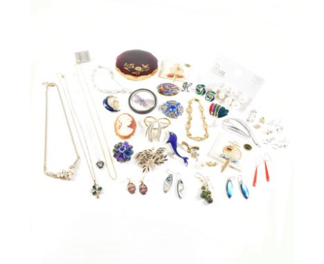 An assorted collection of costume jewellery. The lot to include sapphires, silver, gold and silver tone metal, enamel, white 