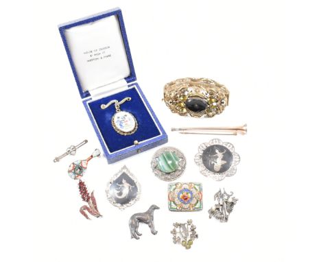 An assorted collection of silver and costume jewellery. The lot to include a rolled gold horn brooch, boxed Mayoress enamel a