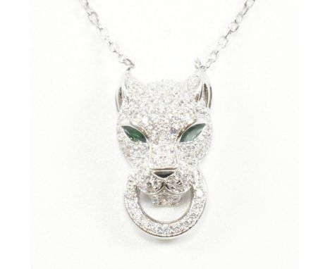 A silver and CZ panther pendant necklace. Weight 5g. Pendant measures 2.3cm.&nbsp;All weights, measurements and sizes are app