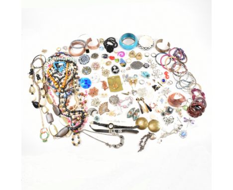 An assorted collection of costume jewellery. The lot to include rings, gold and silver tone metal, plastic, white stones, var