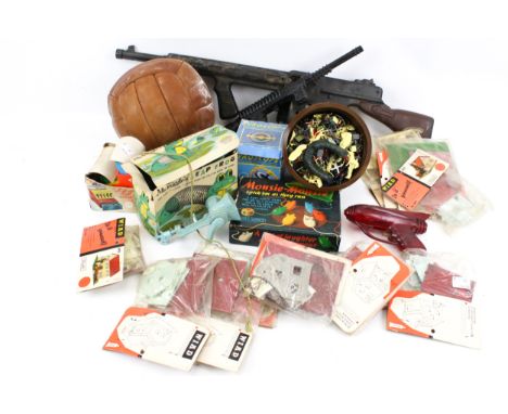 A collection of vintage toys with some new old stock. Including a Marx machine gun, a Gyroscope, model kits, etc.