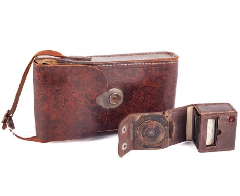 A Kodak Jr No 1 Autographic folding bellows camera. In original leather case, together with a light meter.