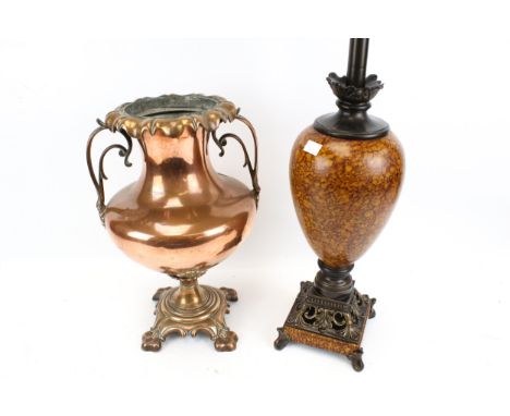 A Victorian copper vat and a contemporary lamp base. The vat with a fluted rim, a pair of handles and raised on four supports