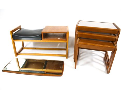 A collection of three mid-century design piece of furniture. Including a nest of three glass top tables, a telephone table wi