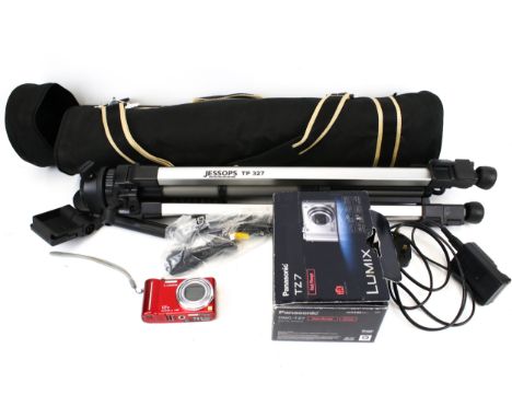 A Panasonic Lumix digital compact camera and a tripod. The camera model TZ7, the tripod in a travelling bag