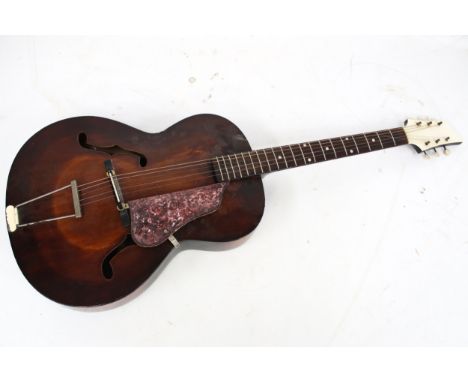 A vintage acoustic six string guitar. H106cm