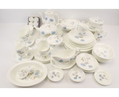 A Wedgwood 'Ice Rose' dinner and coffee service. Including coffee and teapot, jug, gravy boat, side and dinner plates, etc. M