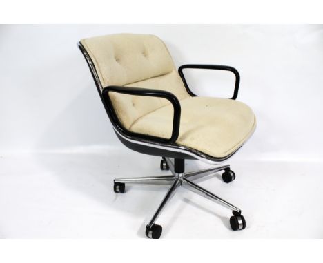 Vintage Retro : Gordon Russell desk chair. With cream button back woven fabric upholstery, black elbow rests, on a chrome mob