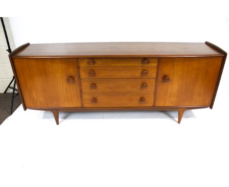 Vintage Retro / mid-century modern  : A J Herbert teak sideboard . Labelled 'A Younger Ltd', with four graduated drawers, the