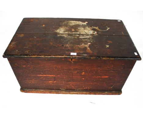 A vintage stained pine chest blanket box. With a hinged lid and a plinth base, L95cm x D54cm x H48cm