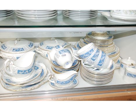 A large quantity of Coalport ''Revelry'' pattern china including Dinner and Tea ware and comprising Meat Plate, eight Dinner 