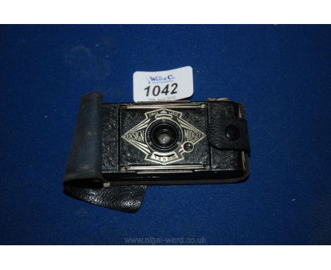 An Ensign Midget ultra compact Camera made by Houghton Butcher of London with original leather cover