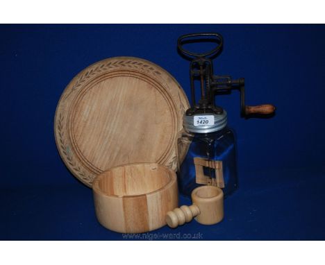 A hand Butter Churn, and a wooden Nut Bowl and nut Cracker.
