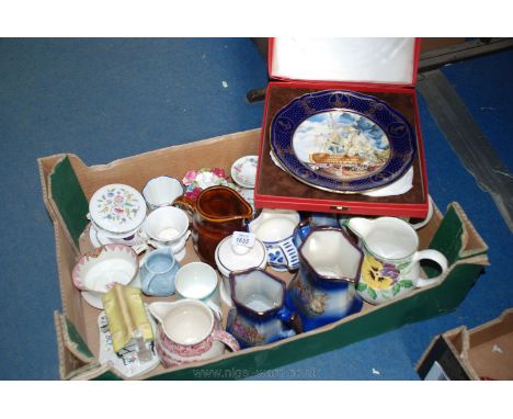 A quantity of china including three graduated Jugs, hand painted with Pansies, a Minton lidded pot, Wedgwood posy vase, boxed