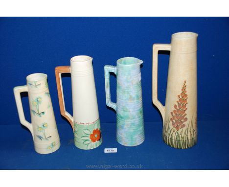 Four Radford Art Deco Jugs in various patterns and all in classic streamline shape