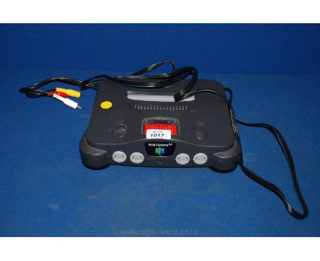 A Nintendo 64 N64 video games Console with WWF Warzone game a/f.