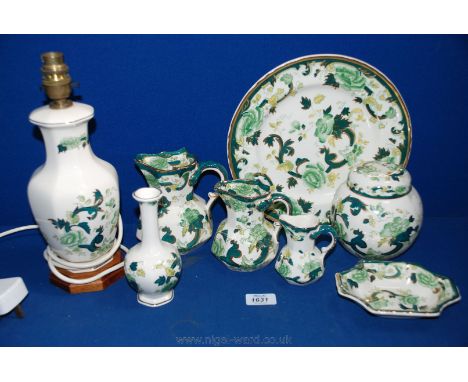 A quantity of Masons 'Green Chartreuse' including three graduated jugs, ginger jar, lamp base, dinner plate, trinket tray and