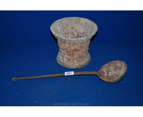 A heavy cast Mortar/Crucible with long handled pouring Ladle