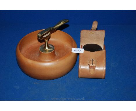 A turned wooden Bowl with Nutcracker and a Shoe polishing Kit