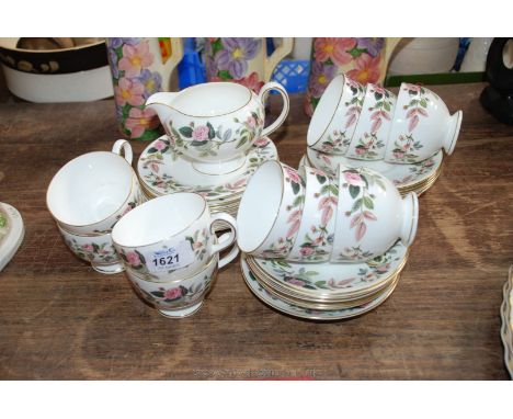 A Wedgwood 'Hathaway Rose' part Teaset including ten cups and tea plates, twelve saucers and a milk jug.
