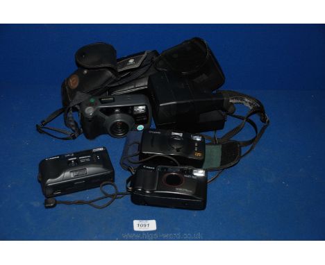 A Polaroid Supercolour 670AF camera, a Pentax 90 WR, Canon multi-tele, Canon Snappy, etc.