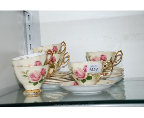 A Royal Albert ''English Beauty'' Teaset comprising six tea cups and saucers and six tea plates