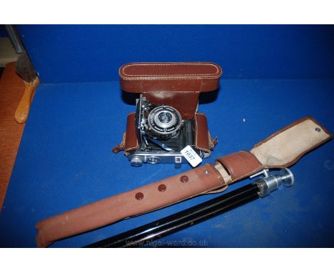 An Ensign 220 Selfix roll film folding bellows Camera with an Ensign Ensar 75mm  f/4.5 Lens and original ever ready case toge