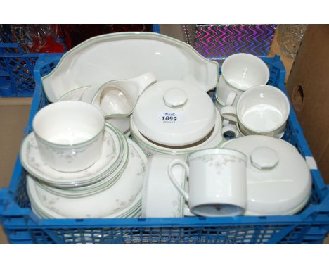 A quantity of Royal Doulton 'Caprice' china including Cups and saucers, lidded Pots, etc.