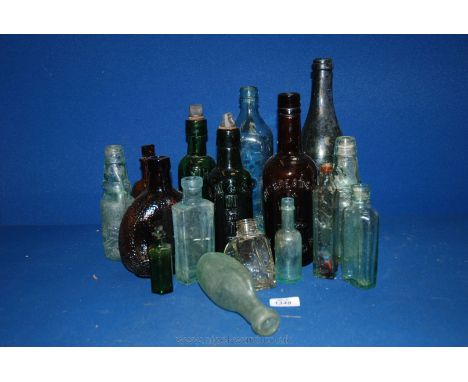 A quantity of bottles including R. White with stoppers, Davies & Co Hereford with marble stoppers, Poison bottles, embossed b