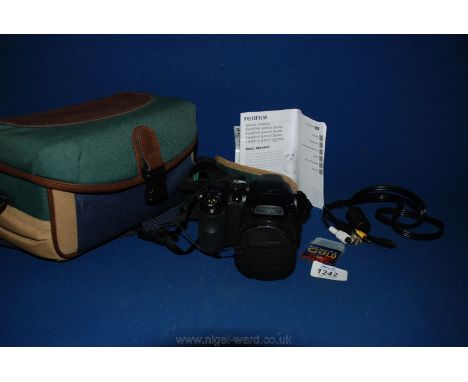 A Fuji Finepix Digital Camera in Benetton case.