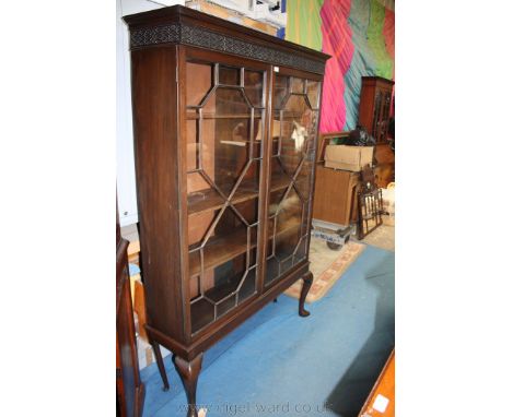 A Victorian Mahogany Chippendale revival style Display Cabinet, having moulded cornice with applied delicate fret-cut mouldin