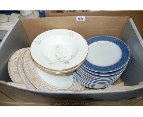 A quantity of china including Royal Doulton 'Sovereign' Dinner Plates, 'Flirtation' Soup Plates and Royal Worcester 'Henley' 
