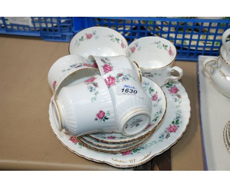 A Royal Stafford part Teaset of five cups, four saucers, sugar bowl and milk jug.