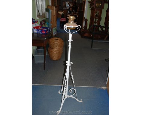 An Edwardian wrought iron Standard Oil Lamp