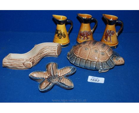 A quantity of Wade including large Wade Tortoise, Star Fish, a small Tree Trunk and three small Jugs decorated with an elepha