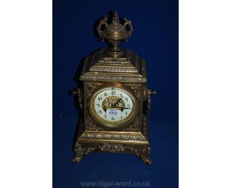 A 19th c. French gilt metal Mantel Clock with urn surmount, enamelled dial (a/f), eight day movement, ring handles to each si