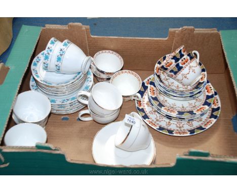 A part Royal Stafford Teaset comprising four Cups and four Saucers in white and gilt Queen Elizabeth ll Golden Jubilee and a 
