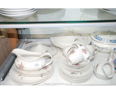 A quantity of Royal Doulton 'Tumbling Leaves' Dinner/Coffee ware comprising six Coffee Cups and Saucers, four Side Plates, a 