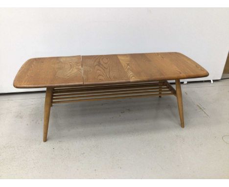 Ercol golden dawn elm coffee table, with shelf undertier 106cm wide x 42cm deepCondition report: Top with split which is quit