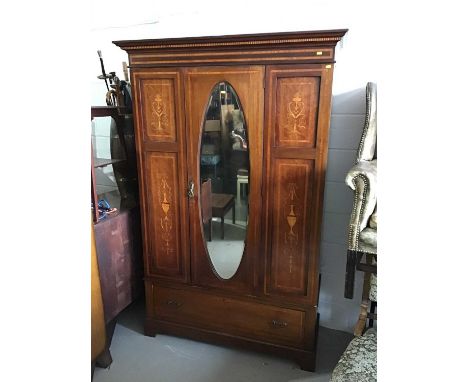 Edwardian inlaid mahogany wardrobe with satinwood cross banding and inlaid panels classical urns and floral decoration, enclo