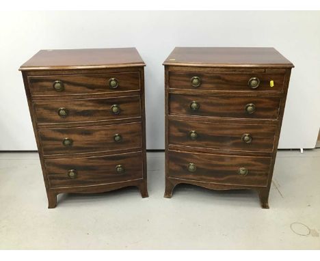 Pair of Regency style mahogany dwarf chest of drawers, each of slightly bowed form, with four graduated drawers on splayed br