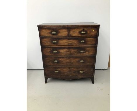 George III mahogany chest of two short and four long graduated drawers with later brass cup handles on splayed bracket feet, 
