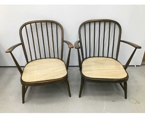 Pair of Ercol elbow chairs together with a small low back side chair