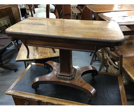 Regency rosewood card table with beaded decoration on square column and quatrefoil base, 92cm wideCondition report: Top is fa